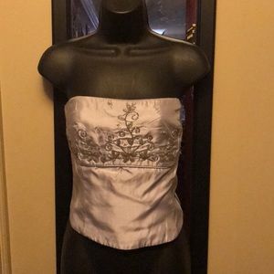 Brand new strapless evening top.